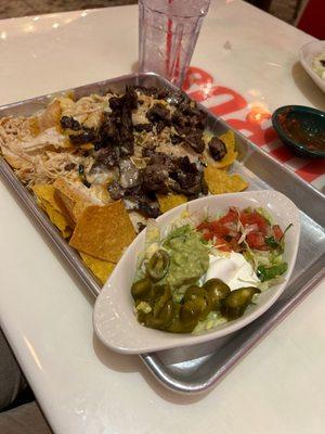 Chicken and steak nachos