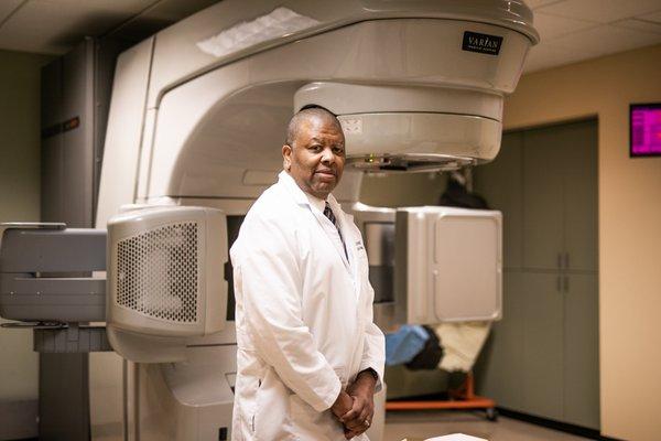 Dr. Benton with LINAC.