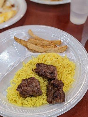 From the buffet: Seasoned rice with ground beef kabob and fries.