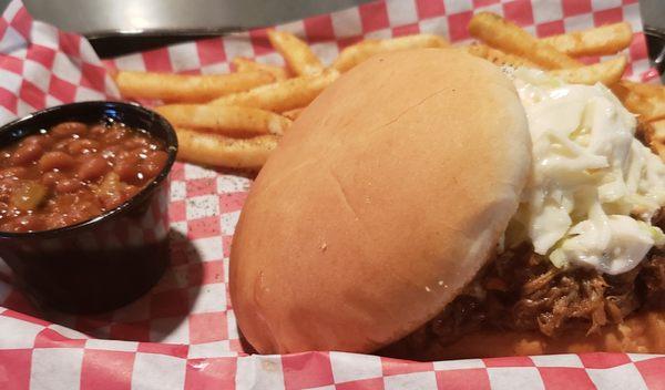 Massive amount of tasty pulled pork & messy as hell!