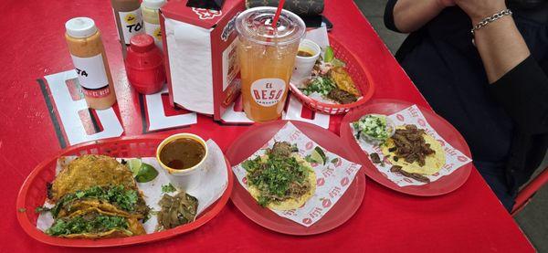 Quesabirria, carnitas, and a tripitas taco, with an agua de melon