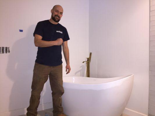 Standalone tub along with tub filler, very modern and stylish look that is appealing to many homeowners.