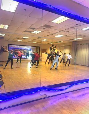 Tapping out rhythms with your feet while moving your body to the beat. Tap Fit Groove gets you sweating, movin and groovin!