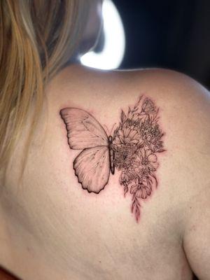 Custom butterfly+birth flowers tattoo
