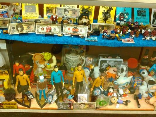 Rock n roll memorabilia, pipes, and knives