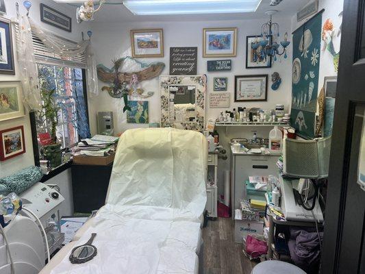 Very cool eclectic art in her procedure room.