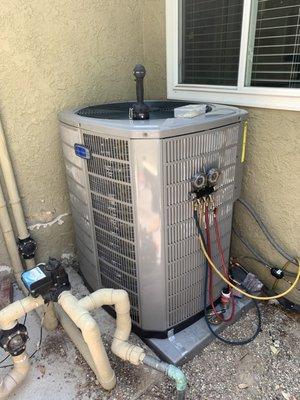 Outside unit with pad being set up.