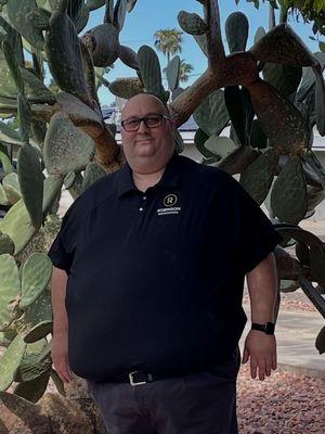 Rob posing for the camera before tackling receipts and spreadsheets.