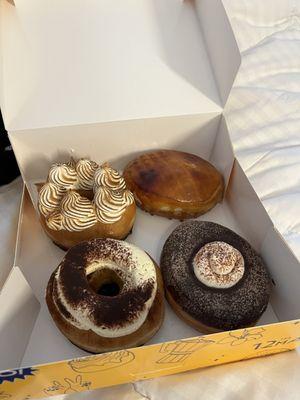 Tres leches donut , passion fruit crème brûlée , tiramisu and Mexican hot chocolate