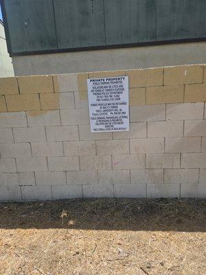 Signage not stating what businesses may park in this lot