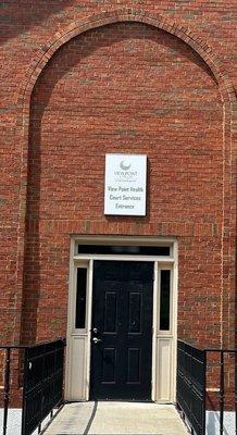 Entrance to Viewpoint Health Court Services around the back building of 318.