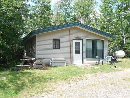 All cabins have 2 bedrooms, bathroom with shower, full kitchen, living room, row boat included
