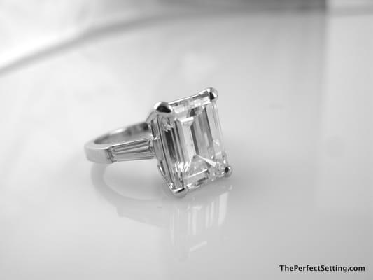 Spectacular 5 CT emerald Cut Diamond with baguettes. Custom Platinum Setting. Can be made with other size and type center stones