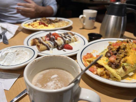 Lots of good food, steak, omelette, steak and eggs, crêpe