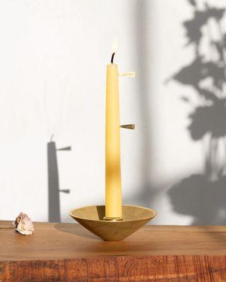Time bell candle for meditation. Made in Japan. A brass bell at the base rings when the small pin falls from the candle as it burns.