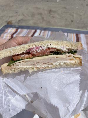 Turkey and provolone sandwich on sliced sourdough. Literally almost nothing to it.