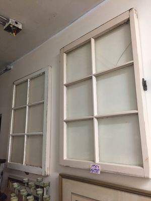 two wooden windows from a house made in 1950's