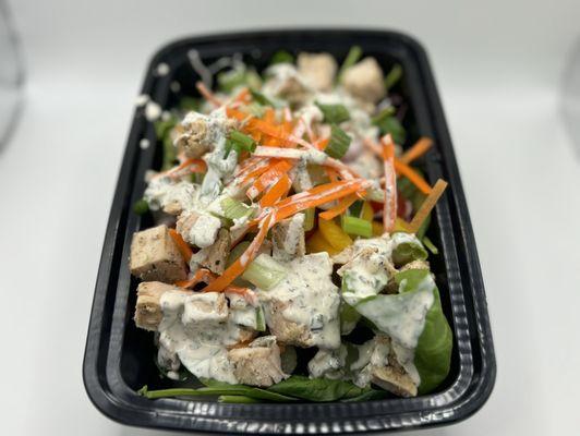 Green machine salad. A TON of veggies with pellet smoked chicken topped with homemade ranch dressing.