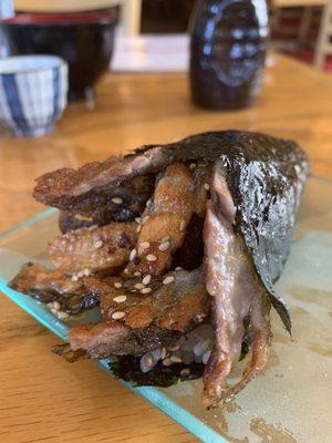 Hand roll salmon skin (fully cooked). This is popular in Japan, order this if you don't want raw food and it's great for kids!