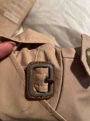 damaged jacket buckle- paint stripped off