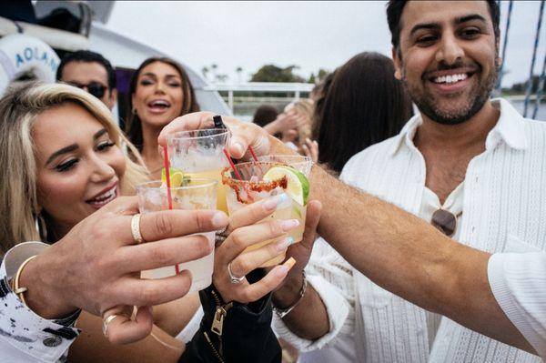 Happy clients celebrating a very special birthday onboard one of my catamarans!