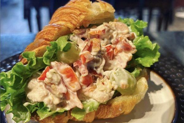 Chicken salad sandwich served in a croissant