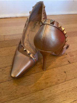 Backs and heels were badly scratched. I'm surprised Shoeber was able to get them looking this good.