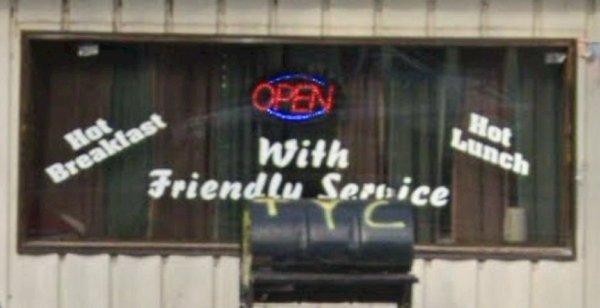 open sign illuminated in restaurant's window