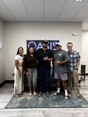 Kalu, my wife, me, Harris, and our broker on signing day.