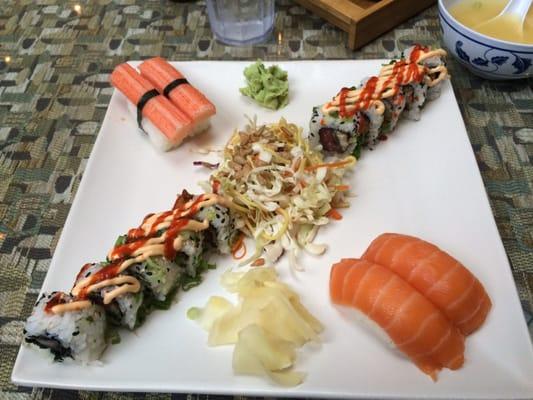Kamikaze roll and 2 pieces of salmon and crab nigiri.