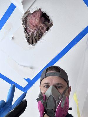 Investigating the cause of water damage in the ceiling in Birmingham, MI