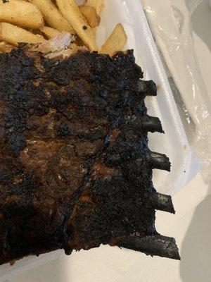 Burned ribs? How do you allow this to leave the kitchen to go to a customer?