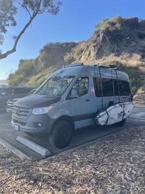 My sprinter with my paddleboard that I will be putting in the ocean much sooner than later thanks to Keenan!
