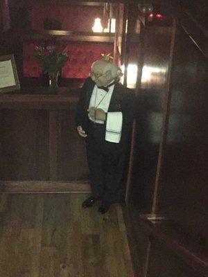 The "greeter" at the bottom of the stairs