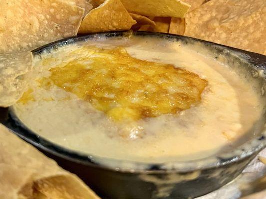 Beer Cheese dip with tortilla chips.