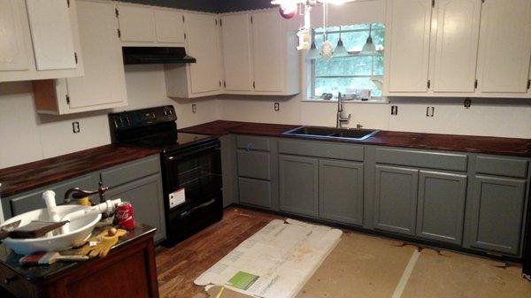 new cabinets and counter tops
 and floor.