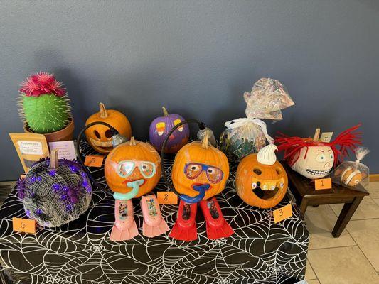 Our team member pumpkin contest for Halloween 2024