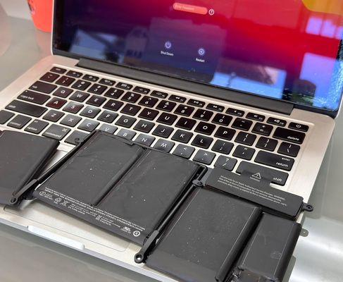 MacBook Pro A1502 Battery Replacement - Power Restored & Ready to Work!