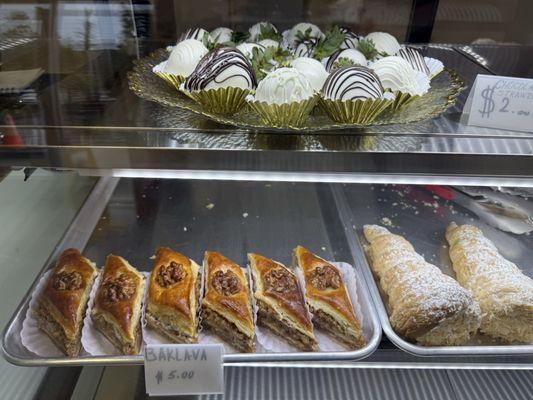 Chocolate covered strawberries, Baklava, and Napolean desserts
