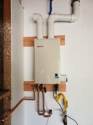 This customer had a 40 gallon tank that was removed and replaced with this space saving Noritz Tankless Water Heater.