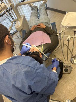 My son getting his cleaning.