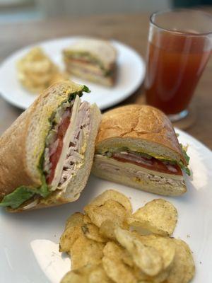 Turkey sandwich on a soft roll. Turkey/Salami on sliced wheat. Delicious. Don't forget chips and a drink.