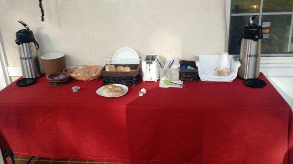 Breakfast on a table outside the office.