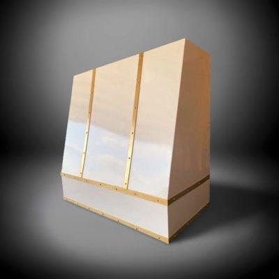 White powder coated tapered range hood with brass strapping and rivets.