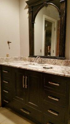 A bathroom vanity with a bottom drawer under the sink base helps utilize the most space out of your cabinet.