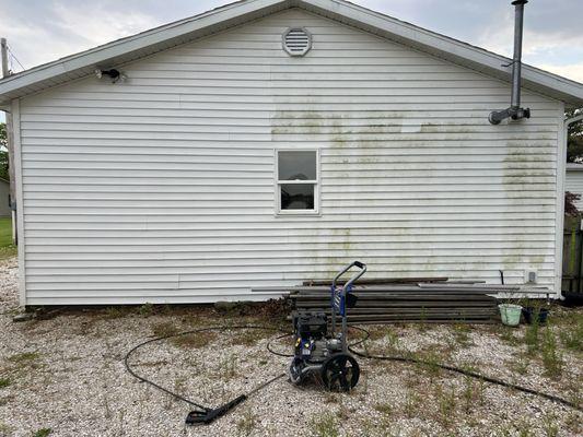 Pressure washed this building.  Before on the right and after on the left.
