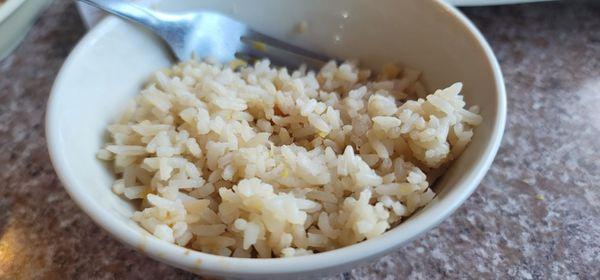 it look like rice with eggs and soysauce drizzle on top , but that definitely not fried rice , it's cheap rice.