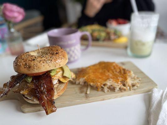 Breakfast bagel sandwich add avocado. Cheesy hash browns side. So good!