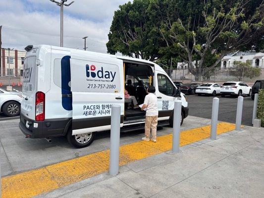 Participant getting off our van infront of the entrance