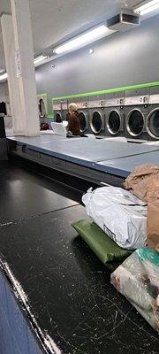 The space, longer than it looks, where I needed to do my clothes, until that stalker guy jumped up there and sat, taking all the room.